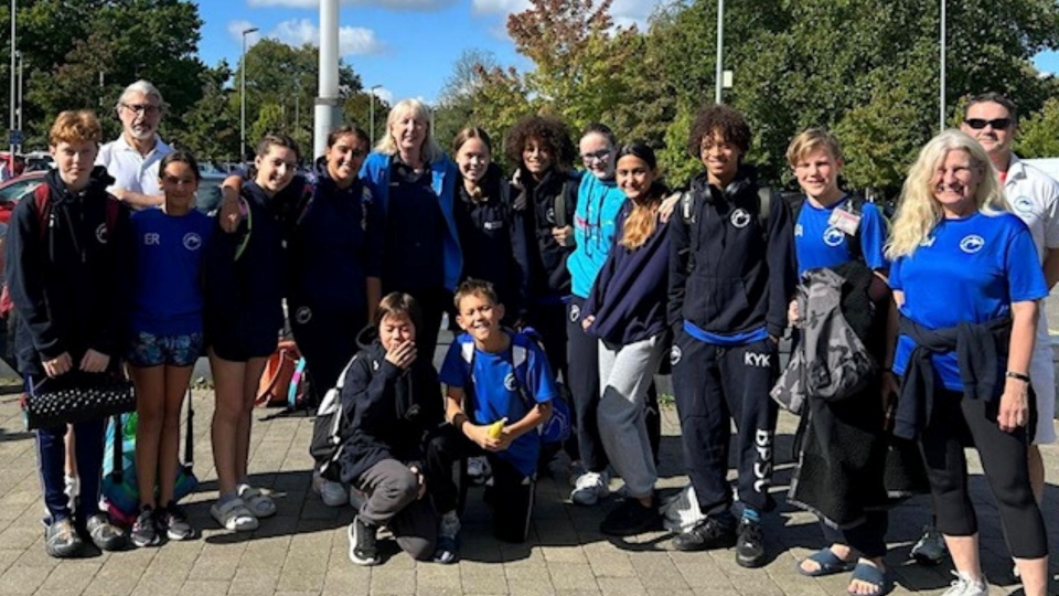 Group photograph of the club swimmers and coaches